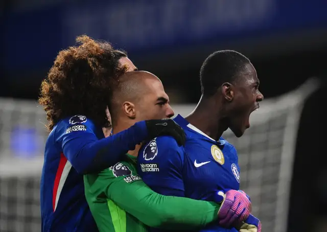 Chelsea players celebrate at full-time