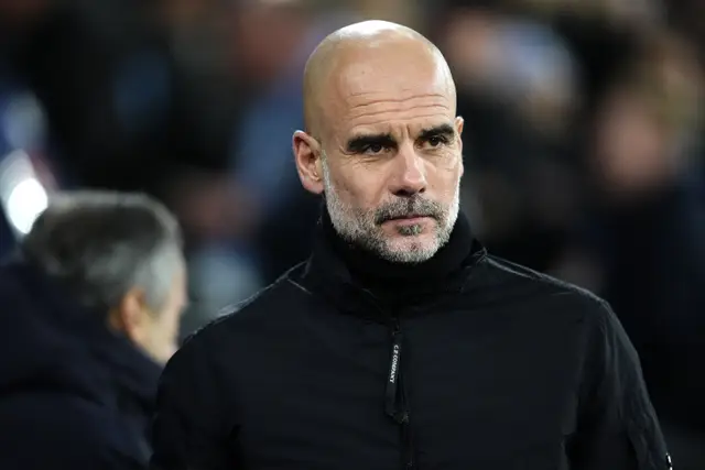 Pep Guardiola on the touchline