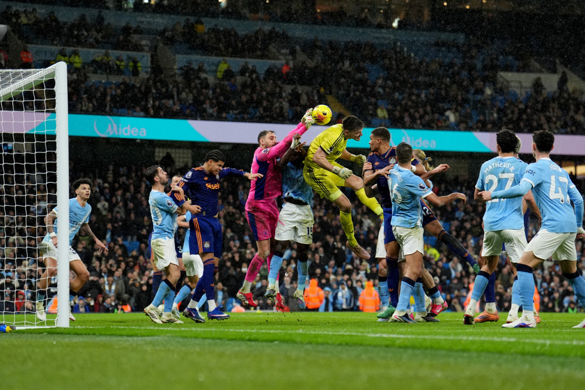 Newcastle United goalkeeper Nick Pope and Manchester City goalkeeper Gianluigi Donnarumma battle for the ball