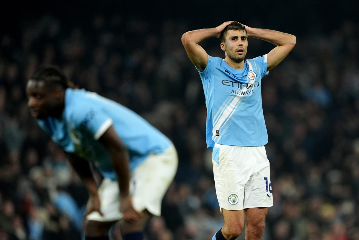 Manchester City’s Rodri (right) and Jeremy Doku (left) react at the final whistle after the draw against Nottingham Forest
